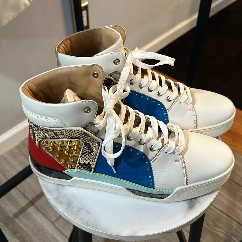 Limited edition christian Louboutin sneakers, original price $3000